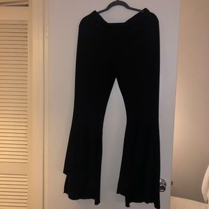 Black stretchy pants with flared bottom